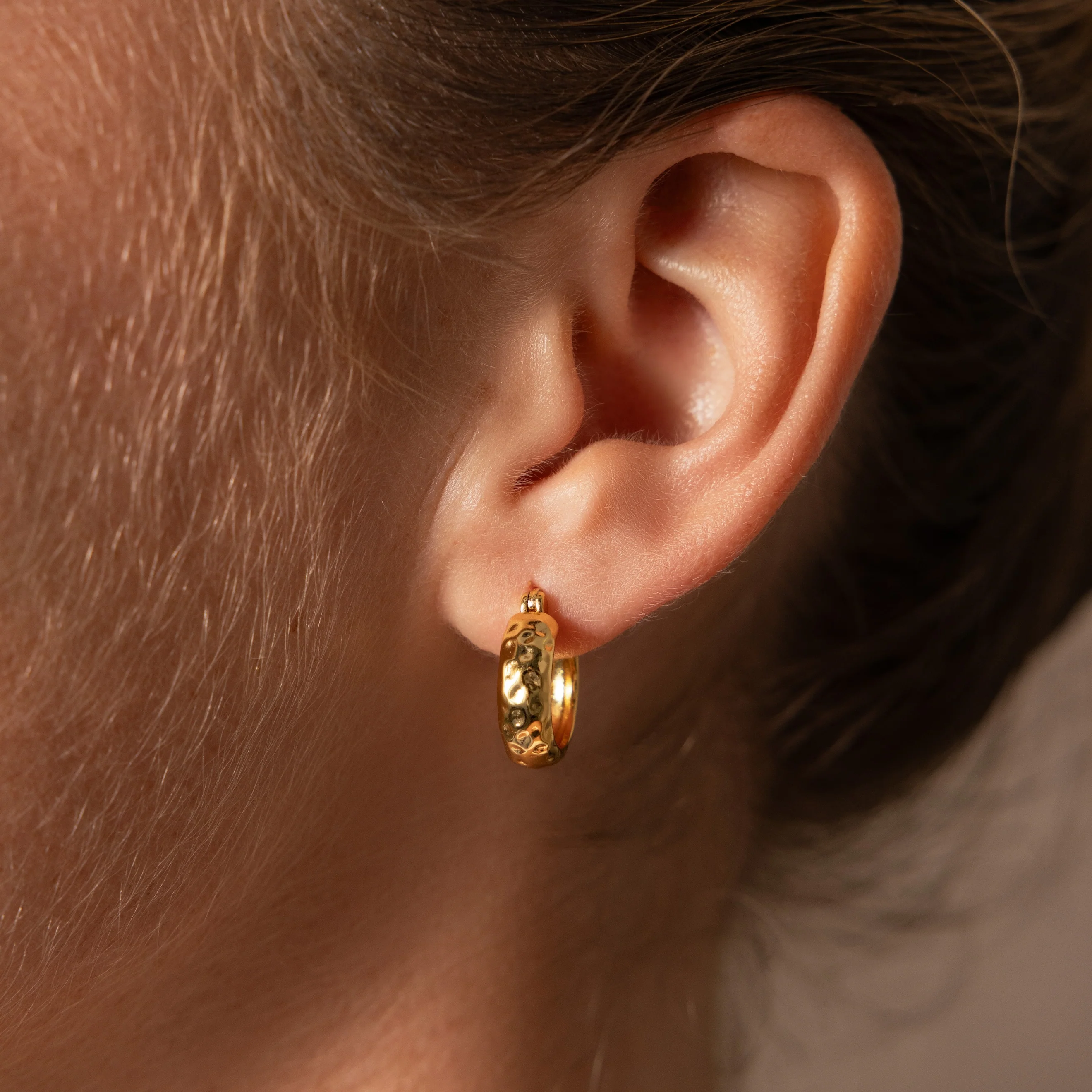 Bold Hammered Huggies in 18K Gold - Image 2
