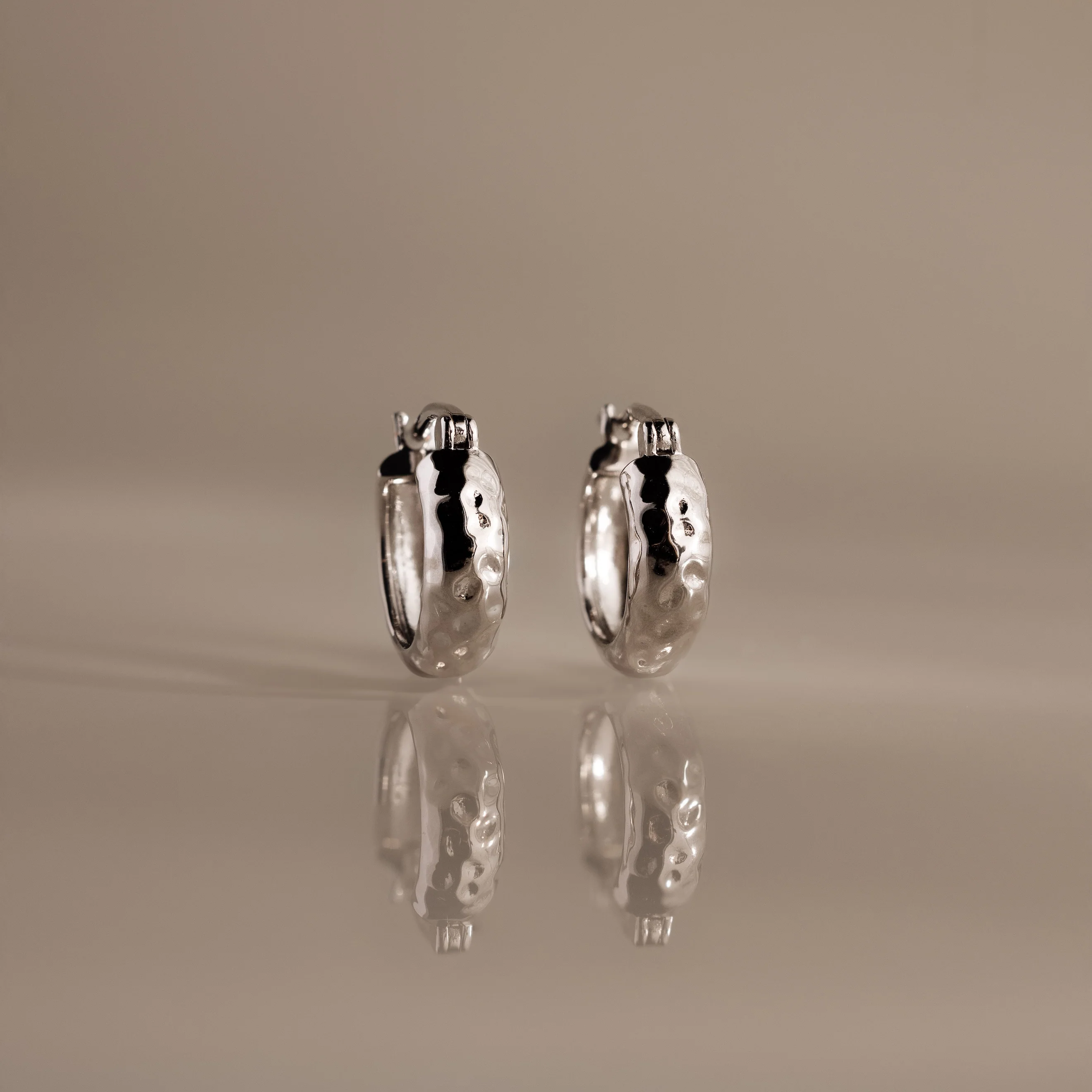 Bold Hammered Huggies in Silver
