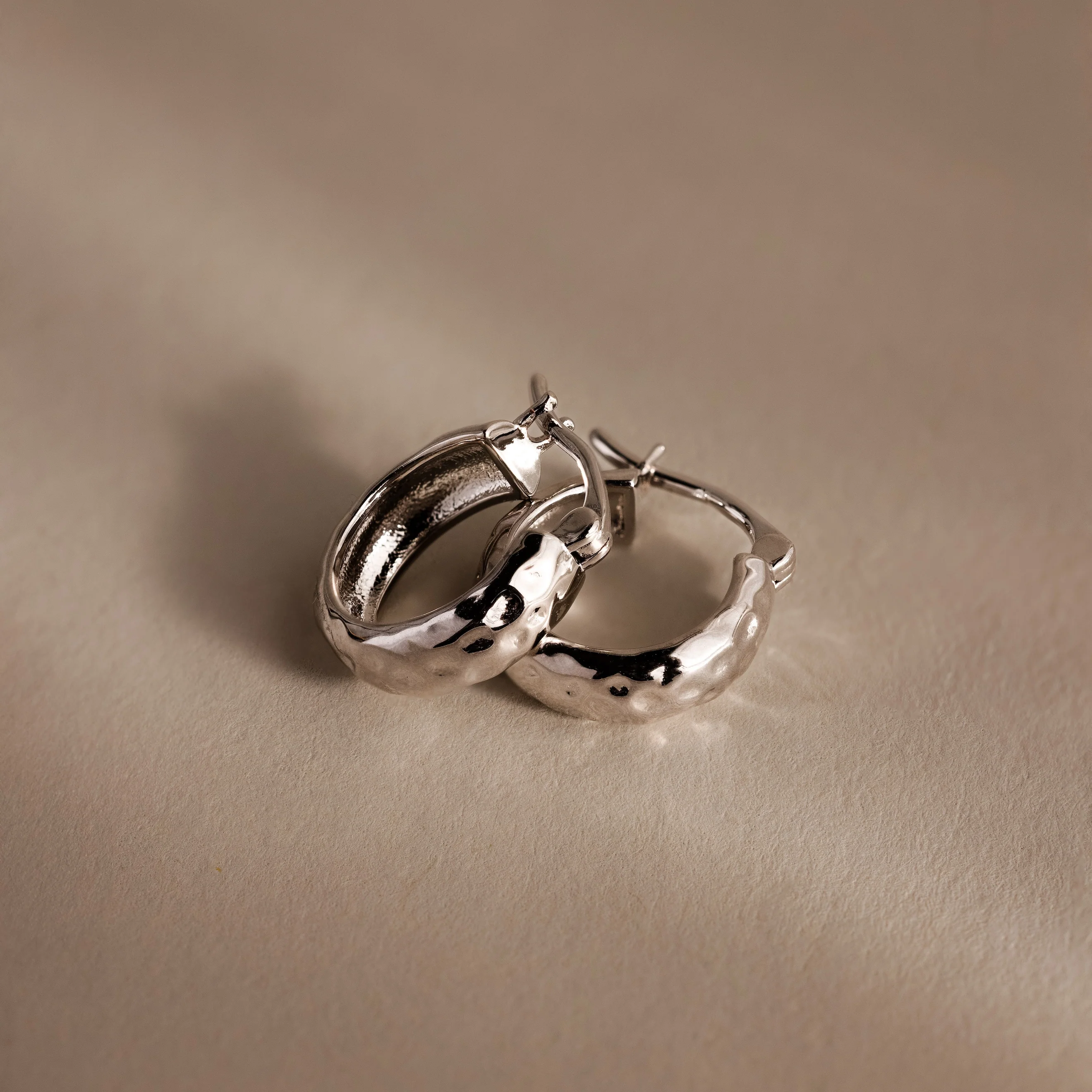 Bold Hammered Huggies in Silver - Image 7