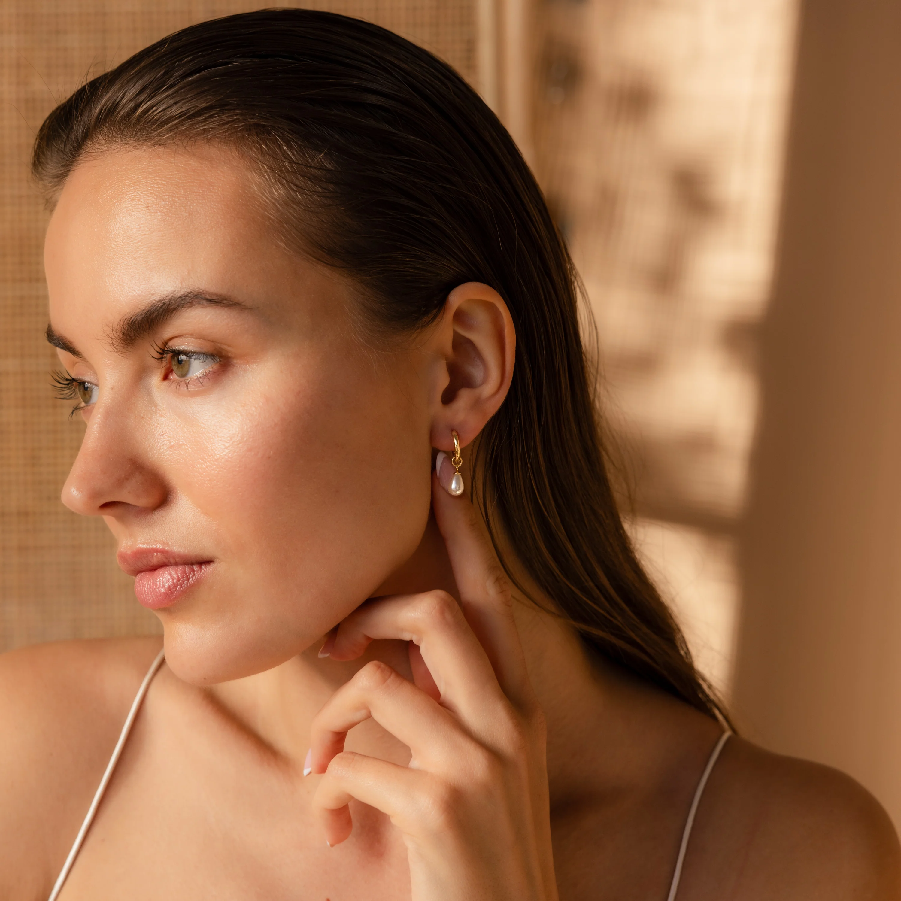 Dainty Pearl Drop Huggies in 18K Gold - Image 4