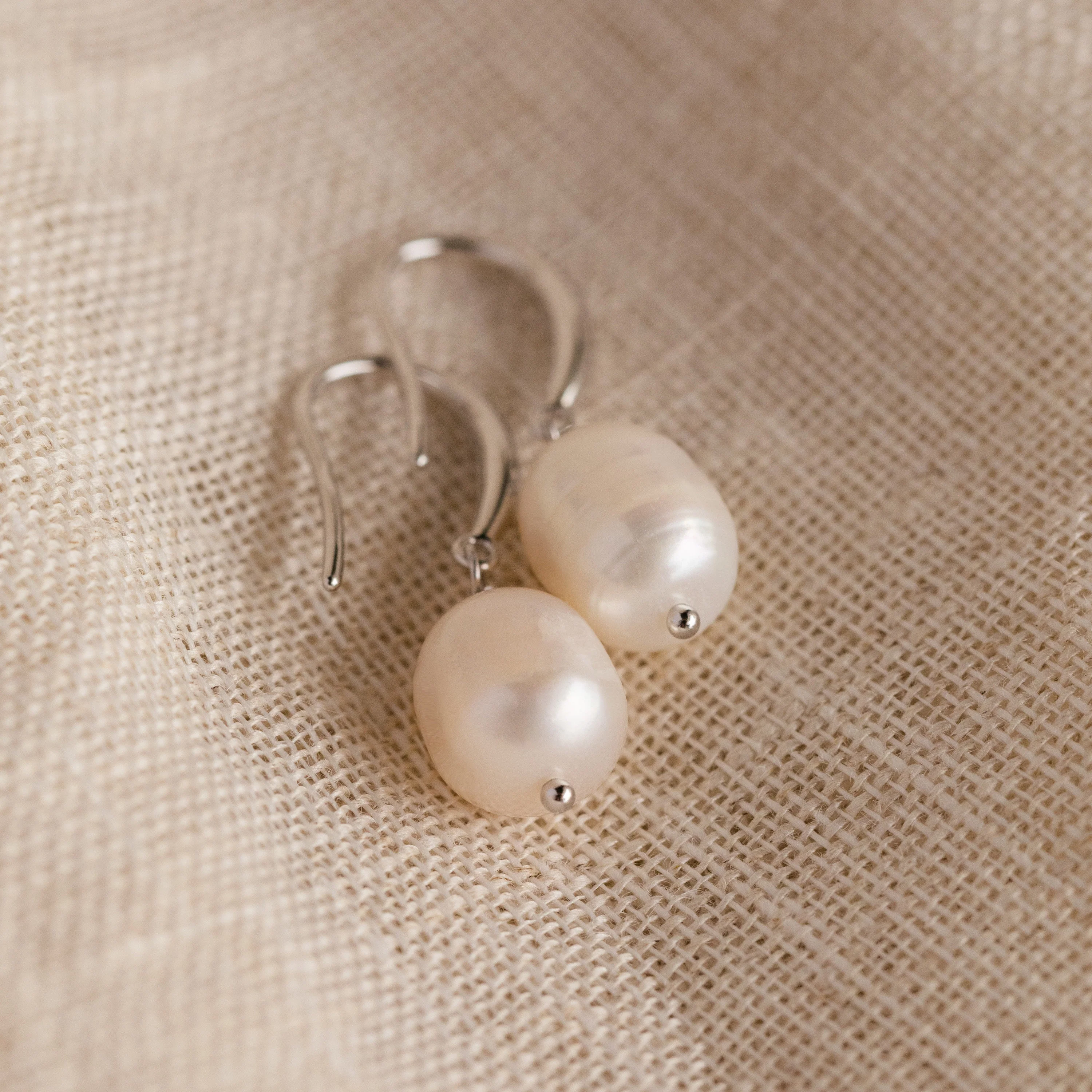 Dangling Pearl Drop Earrings - Image 5