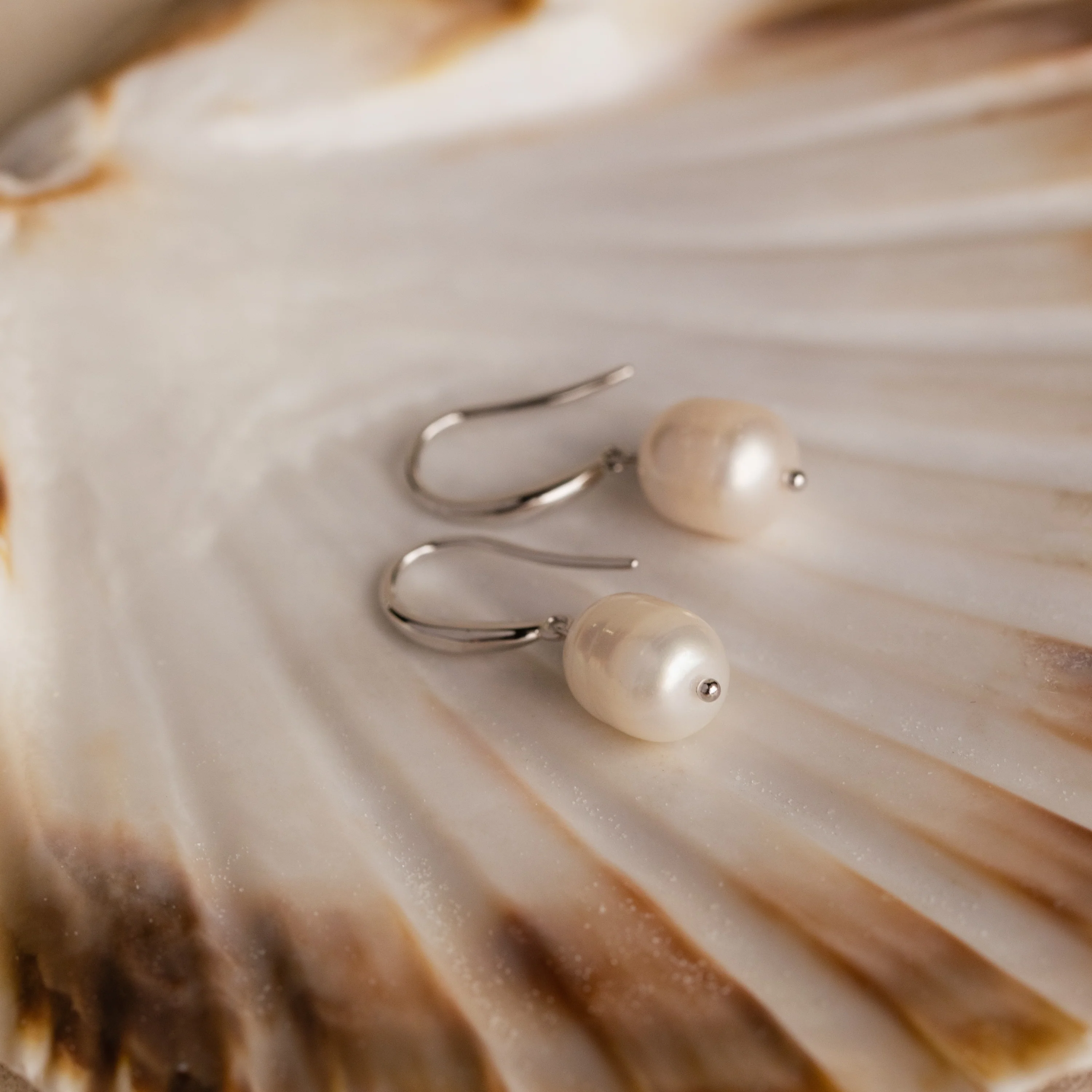Dangling Pearl Drop Earrings in Silver - Image 5