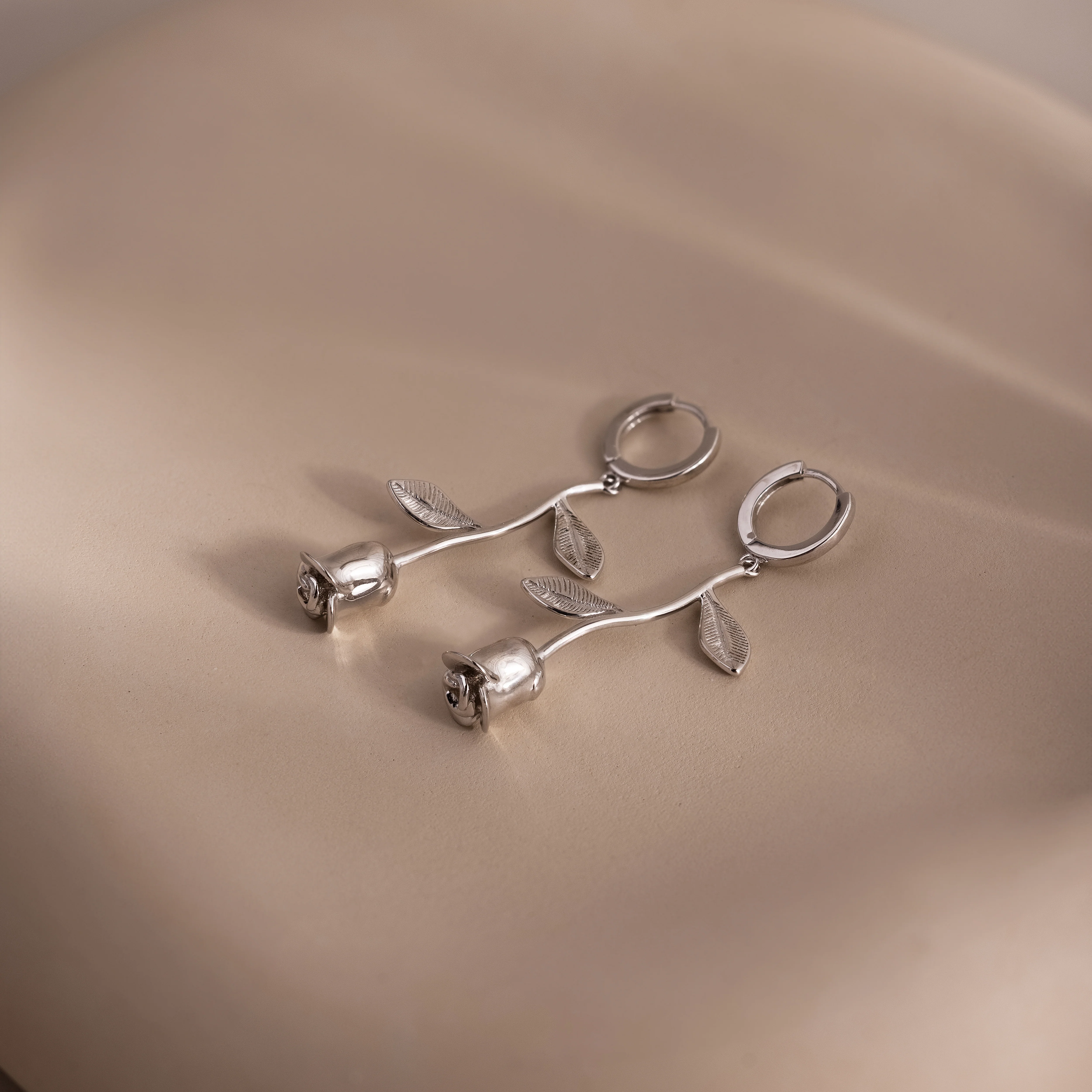 Dangling Rose Huggies in Silver - Image 4