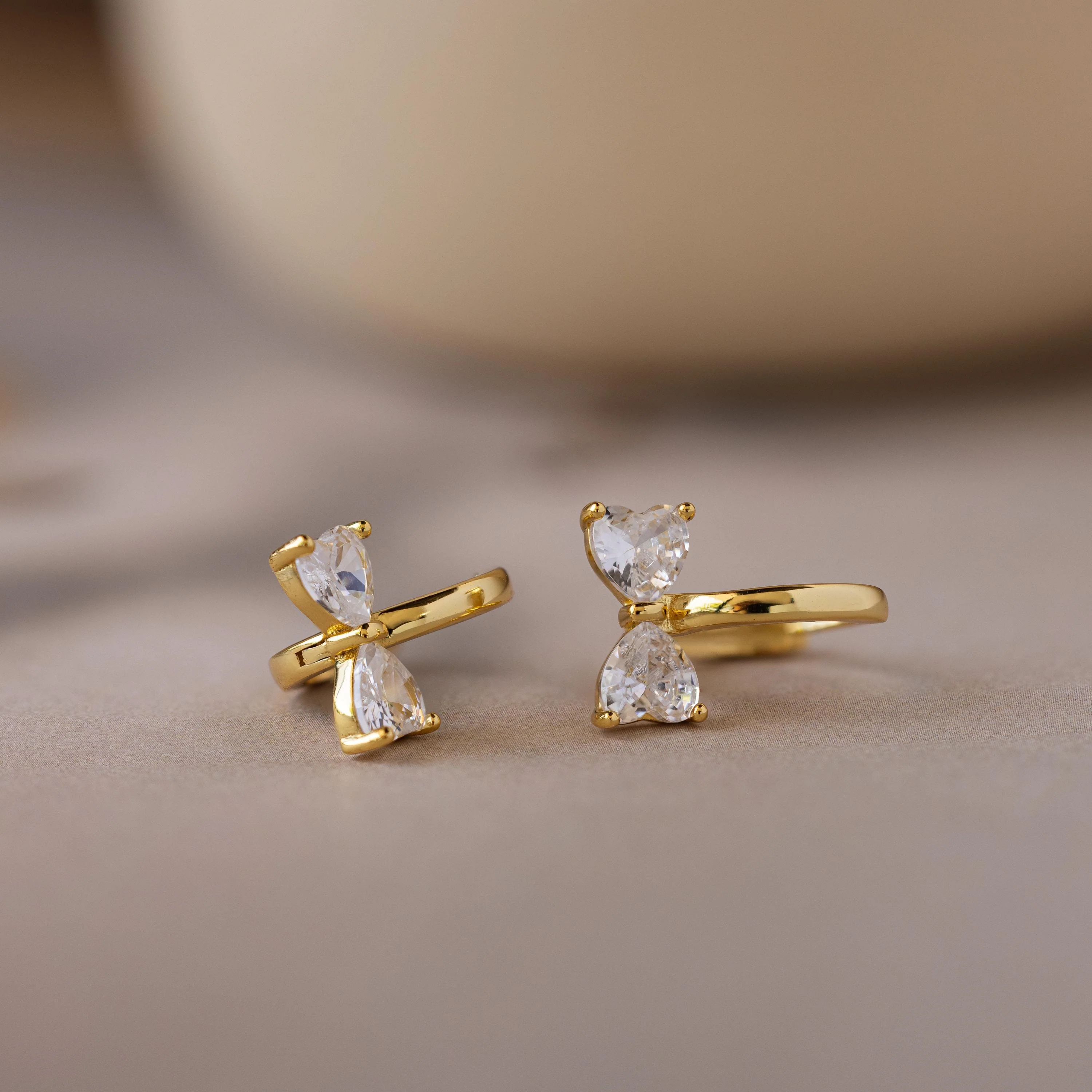Diamond Bow Huggies in 18K Gold - Image 4