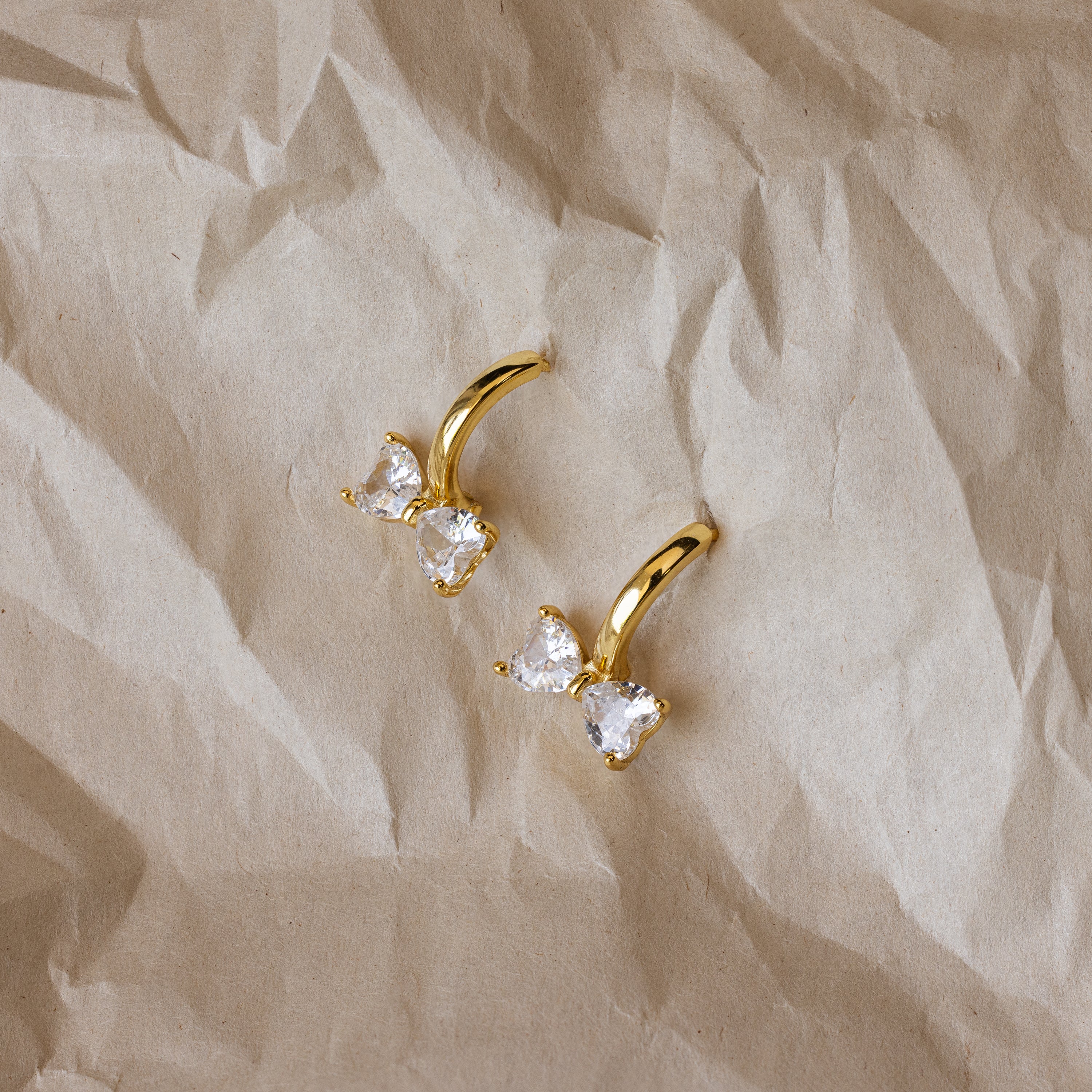 Diamond Bow Huggies in 18K Gold - Image 6