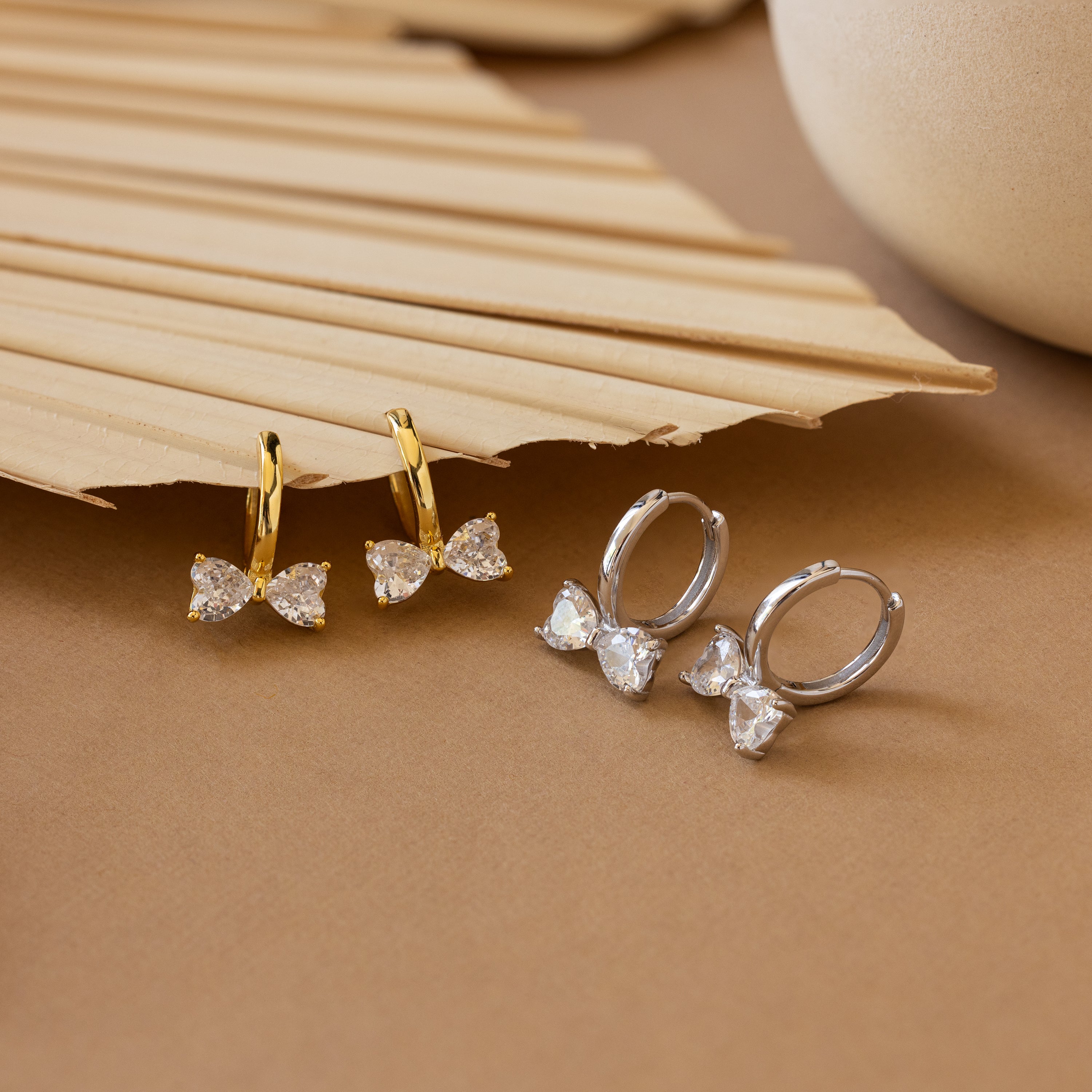 Diamond Bow Huggies in Silver - Image 4