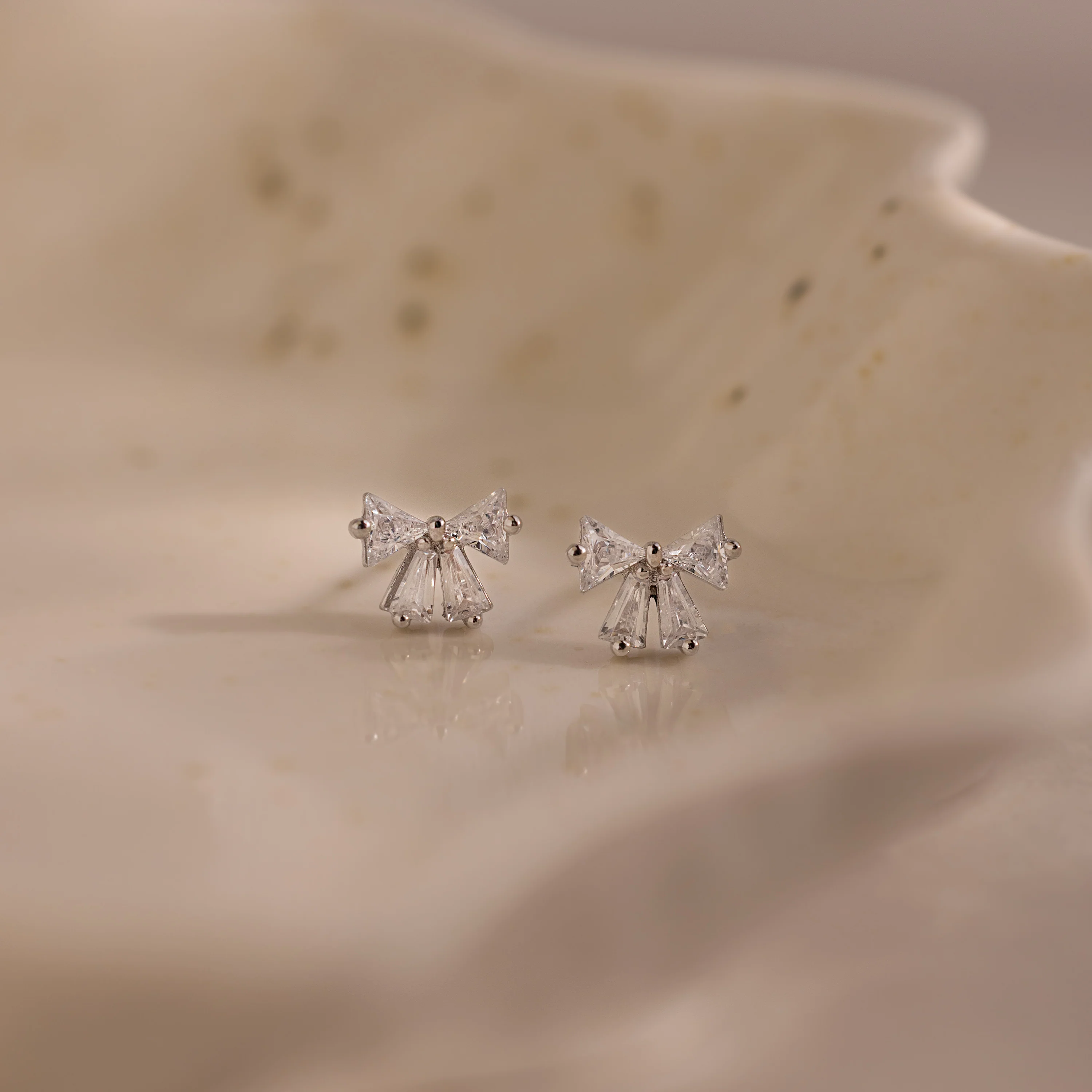 Diamond Bow Studs in Silver - Image 3