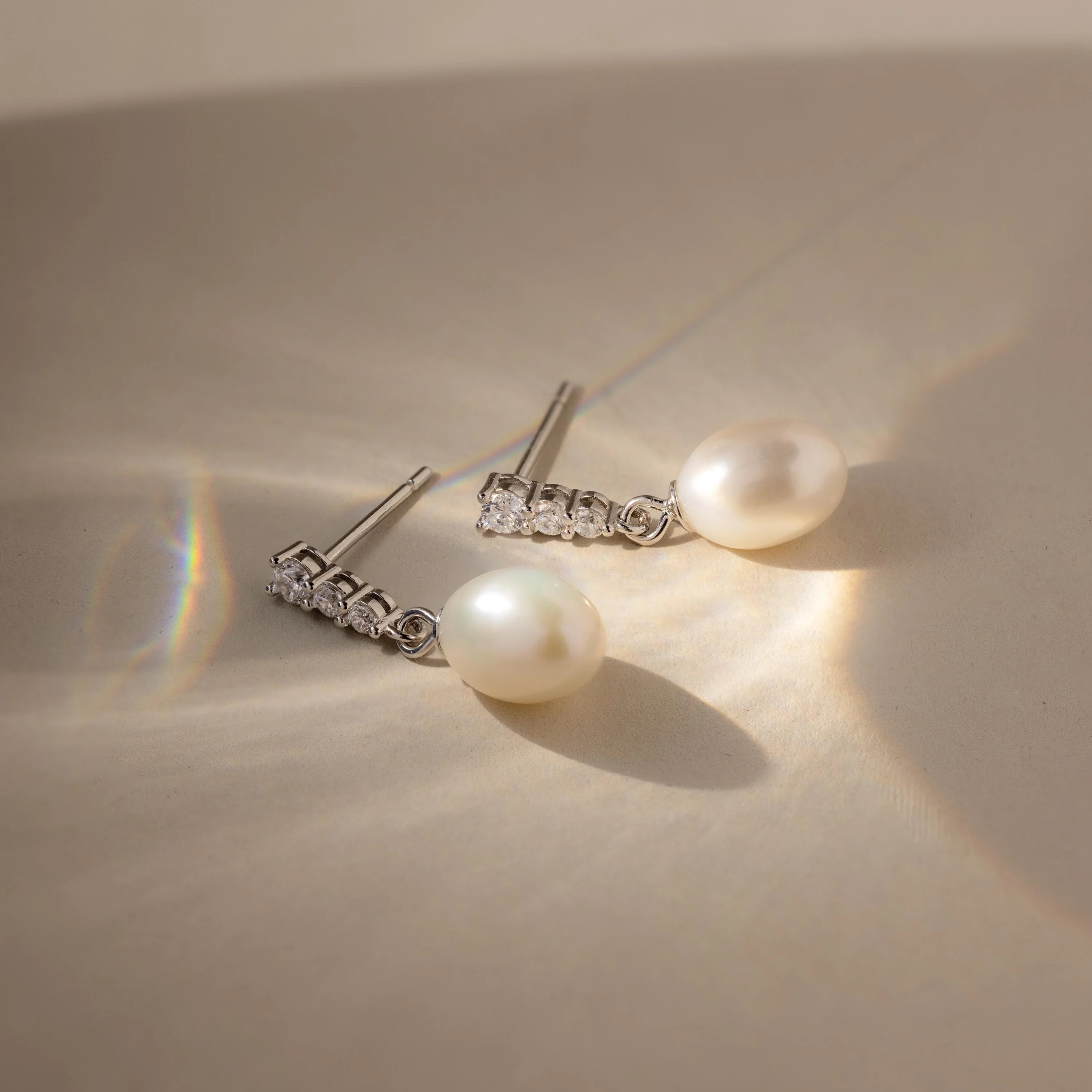 Diamond Pearl Droplet Earrings in Silver - Image 3