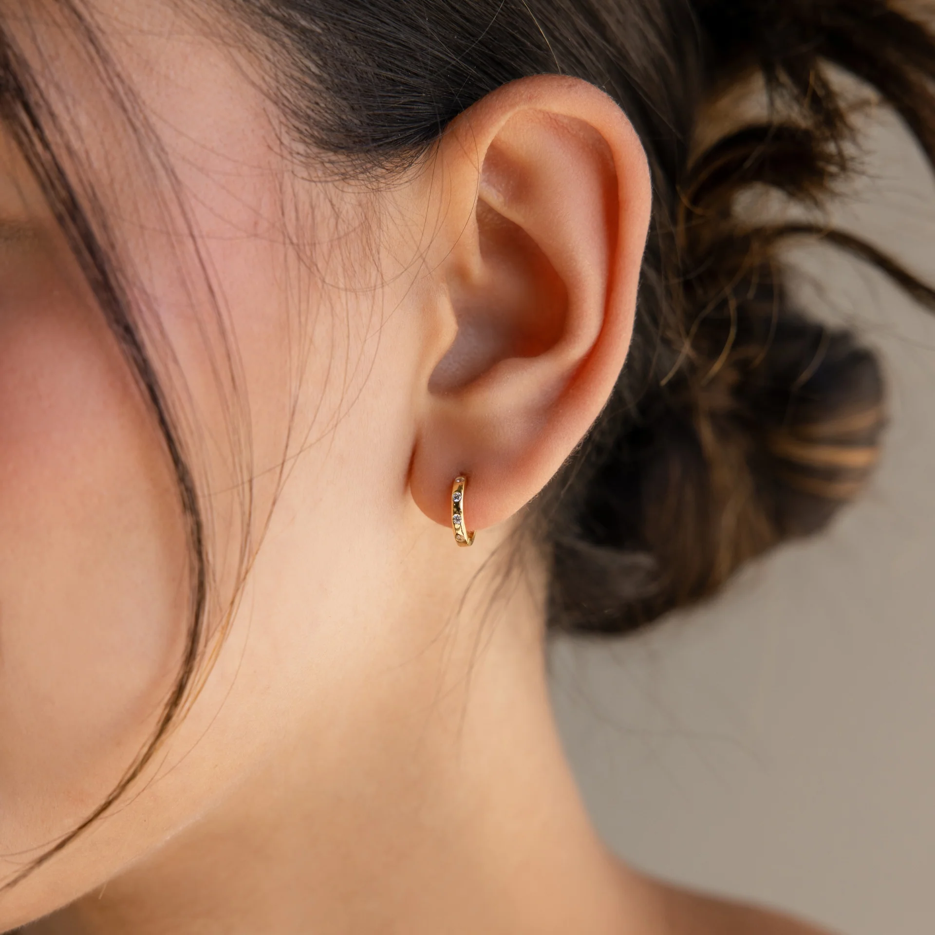Mini Diamond Sprinkle Huggies in 18K Gold - Image 2