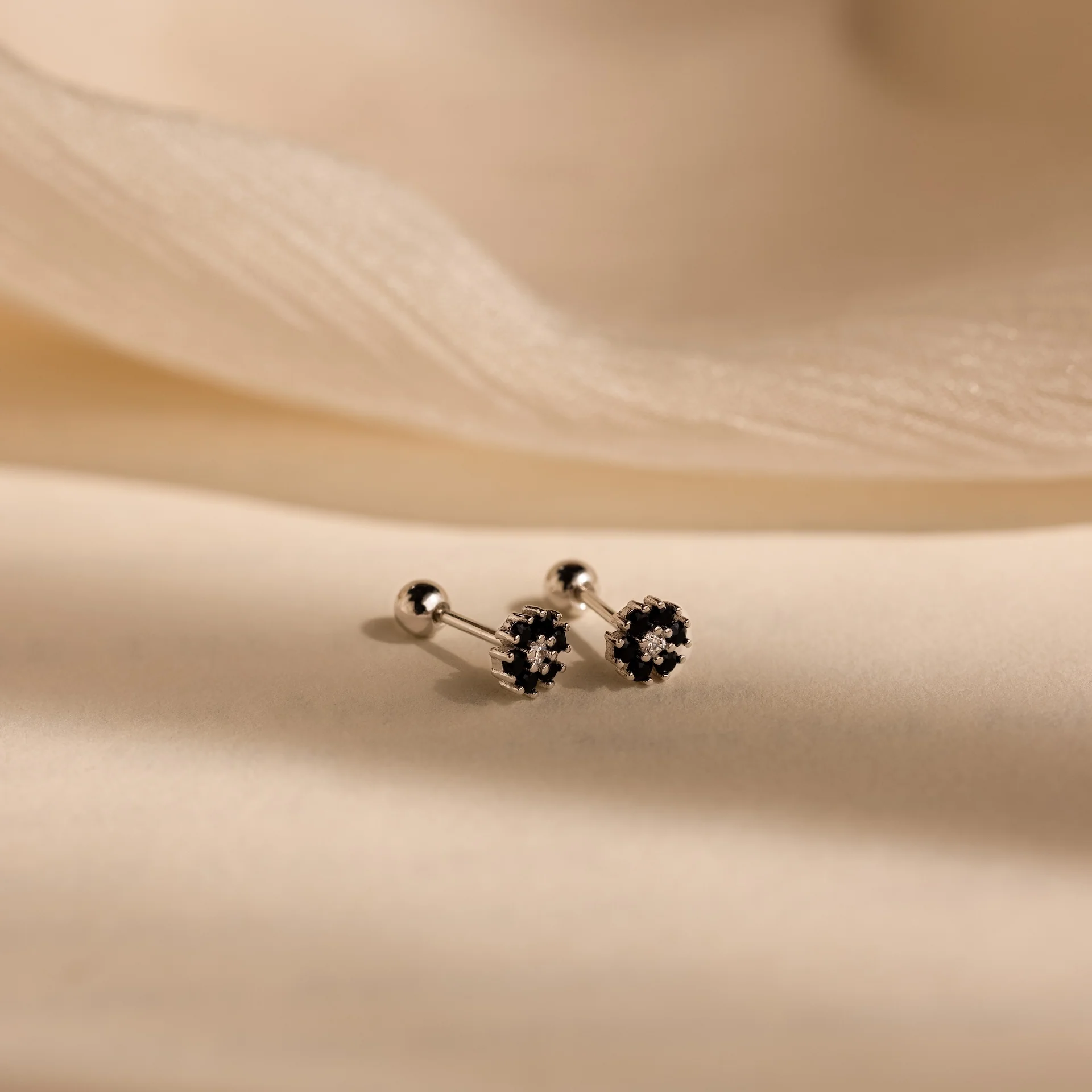 Onyx Flower Studs in Silver