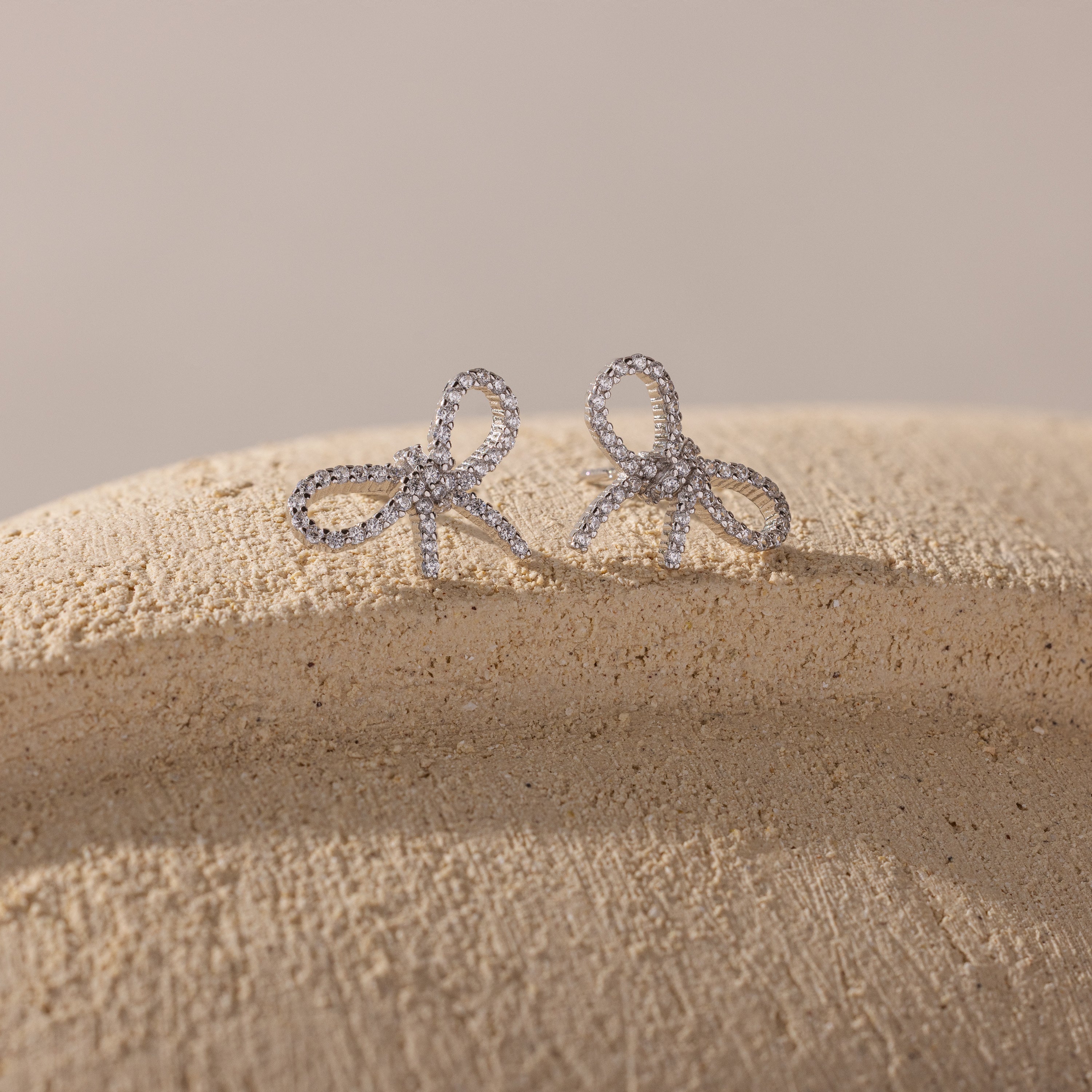 Pave Bow Studs in Silver - Image 3