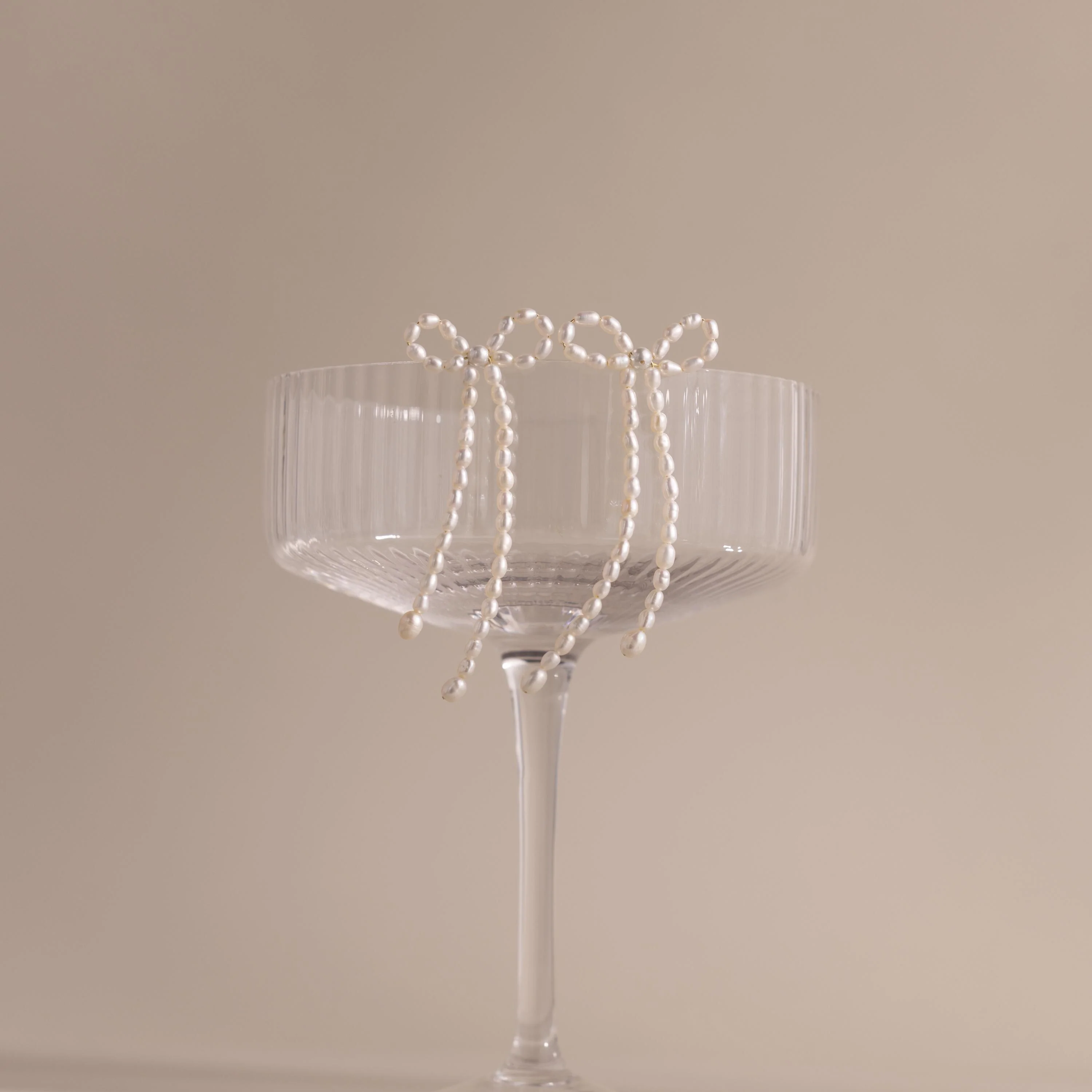 Pearl Bow Earrings - Image 6