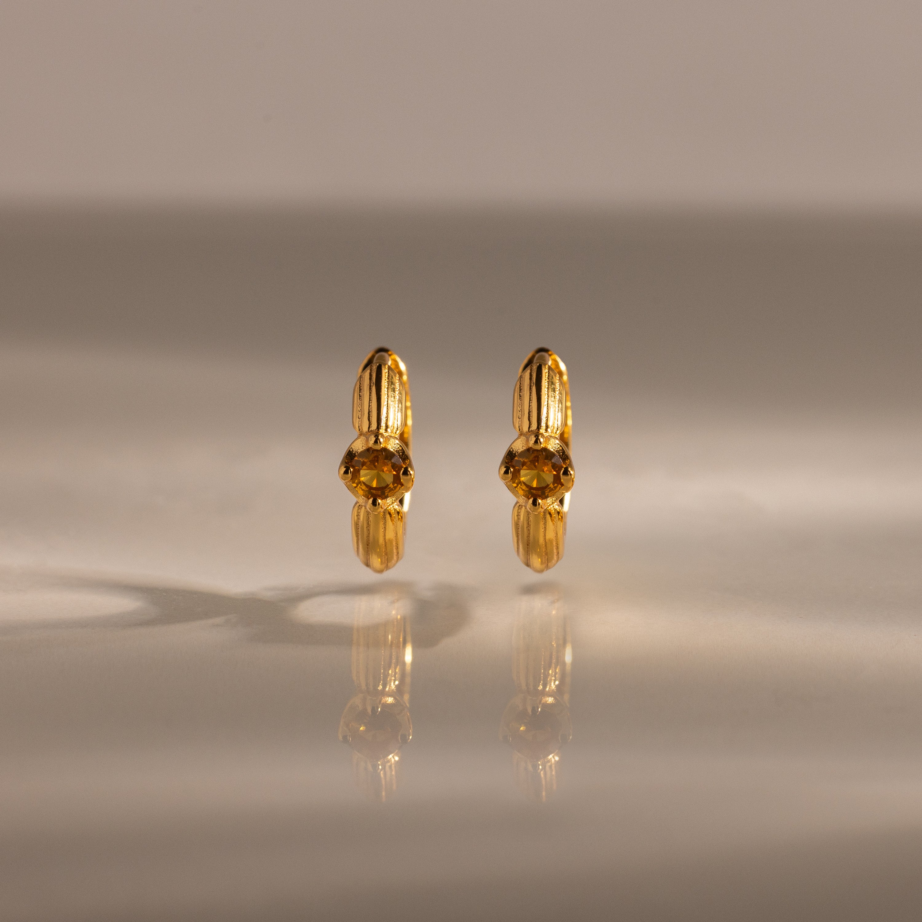 Ribbed Topaz Huggies