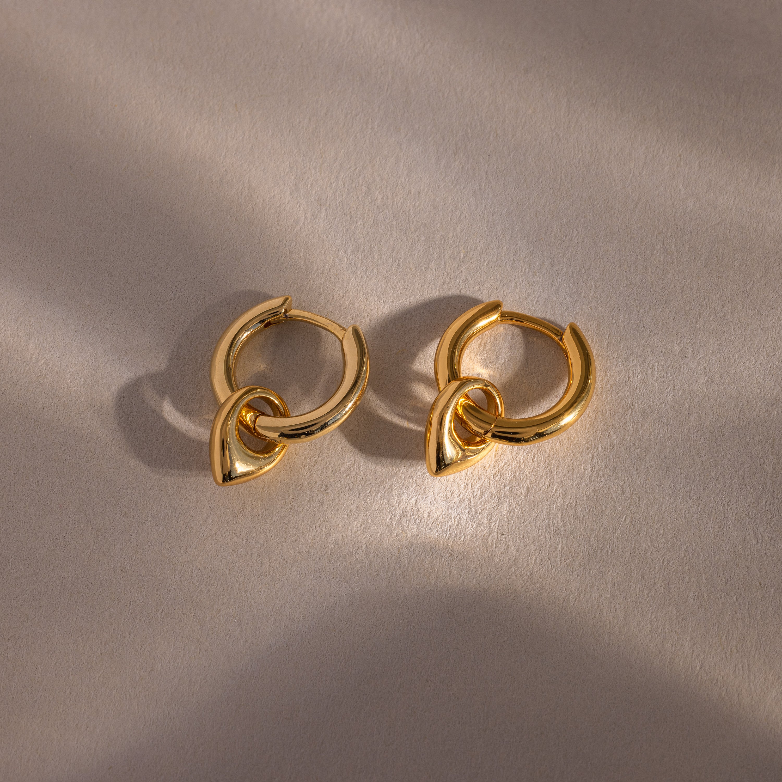 Tiny Teardrop Huggies in 18K Gold - Image 3